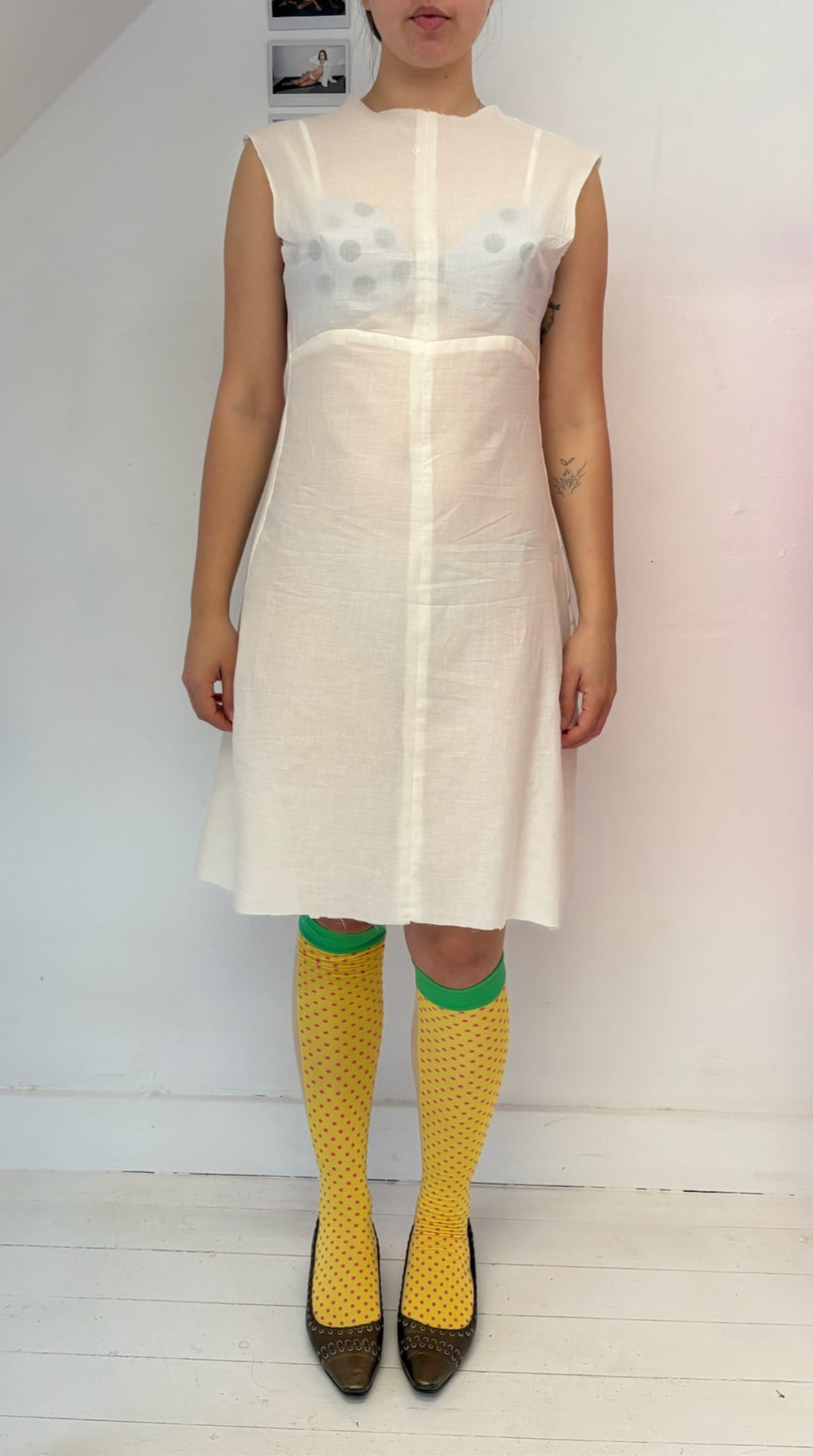 The designing of a dress.